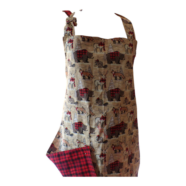 Apron with forest  animal pattern on front and red plaid on reverse