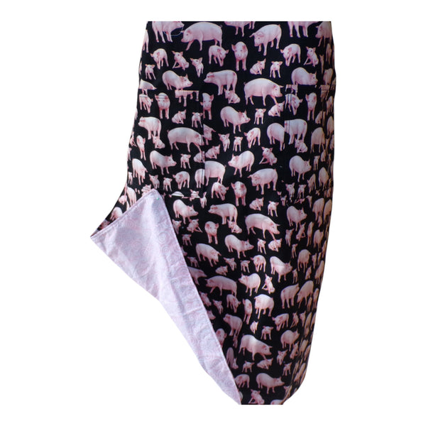 Apron with pigs on front and pink swirls on back