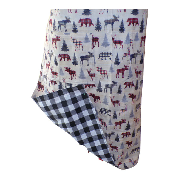 Apron with forest animals on front and black plaid on reverse